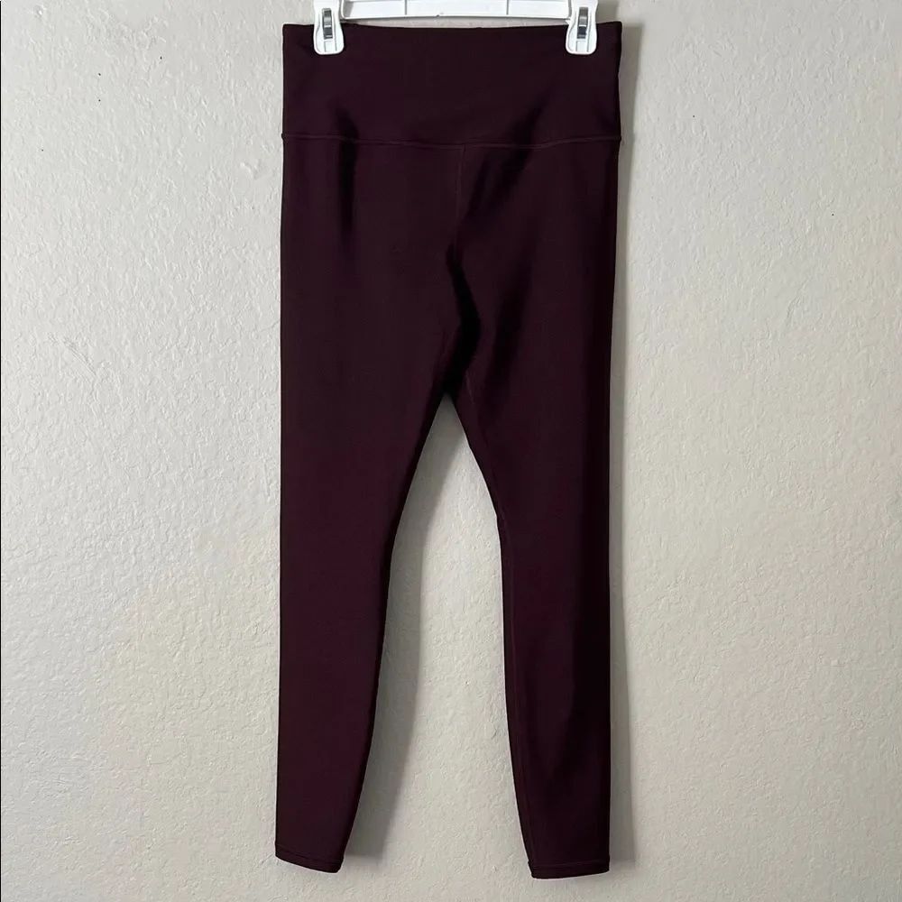NWOT Athleta Elation Sheen Tight Leggings Burgundy in Size M